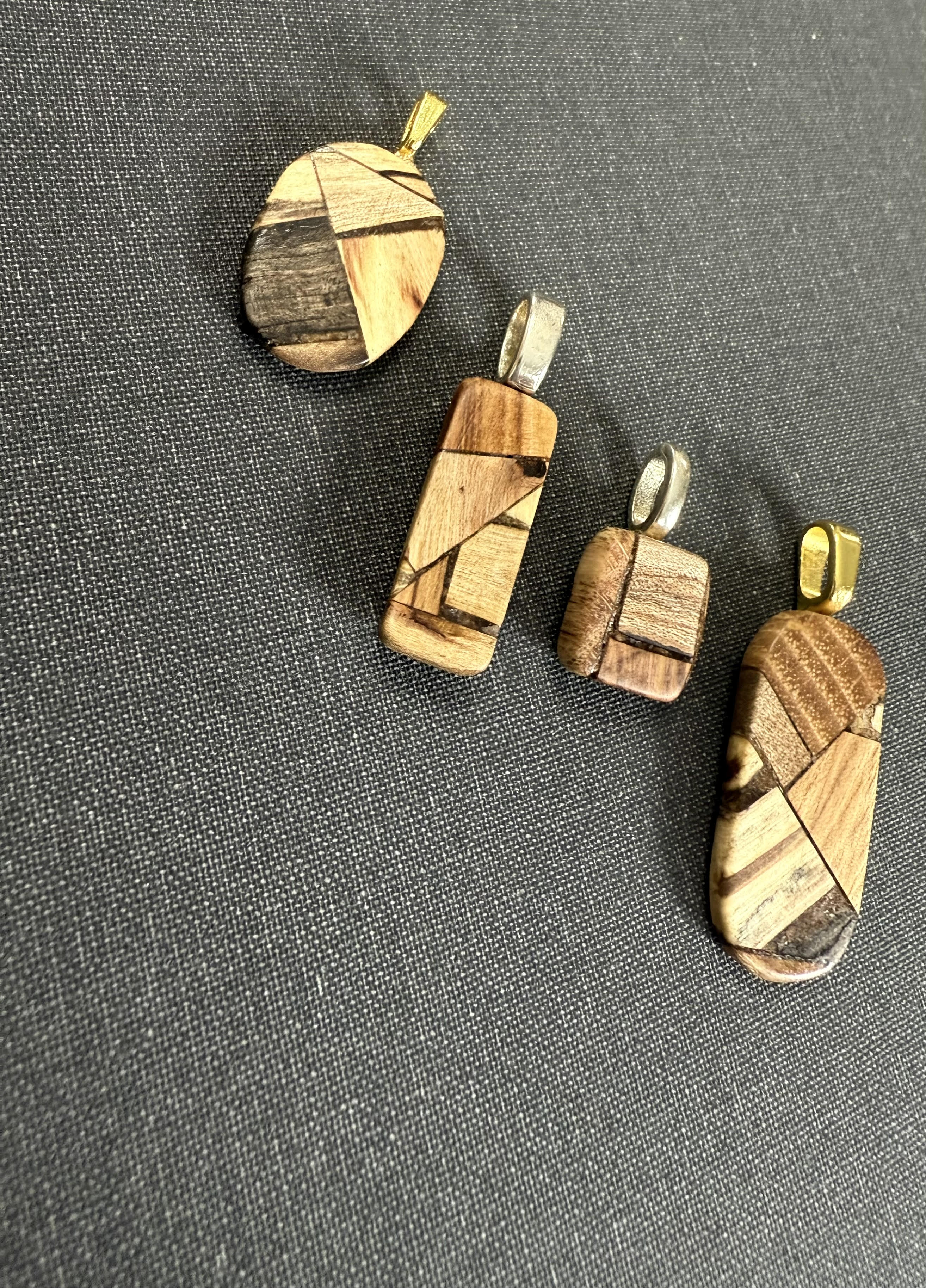 Patchwork Wooden Pendants from Little Valley Wood Shop, Wooden necklaces, nature jewelry, sustainable jewelry, necklaces from reclaimed wood, recycled jewelry, patchwork wood design, small business, handmade jewelry, handmade necklace, wood working, wooden patchwork pendants, unique gifts, ecofriendly gifts, sustainable gifts